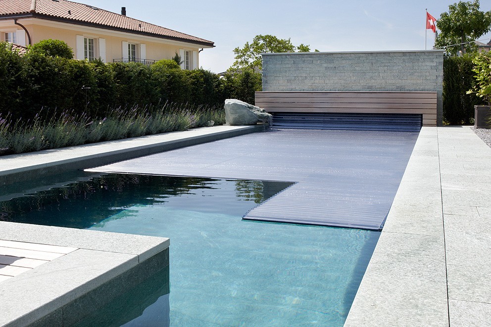 Bio Pool in Switzerland tiled with granite