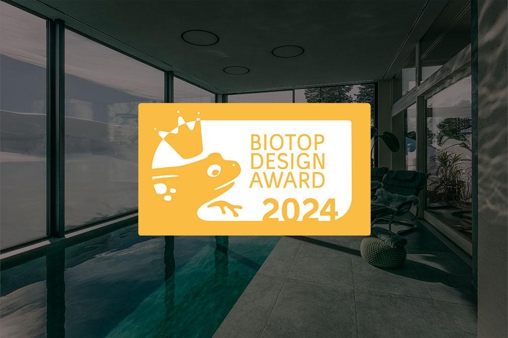 BIOTOP Design Award 2024 logo in front of Indoor Living Pool