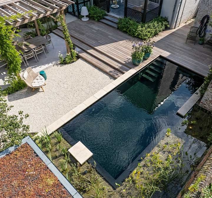 Biotop Swimming Pond with black pool liner in a residential neighbourhood in the Netherlands