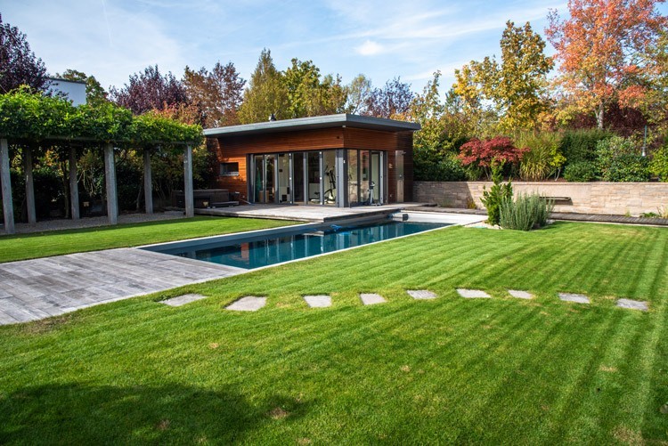 A low maintenance Living Pool from Biotop surrounded by rolled turf