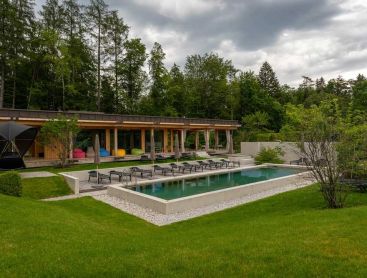 The Bergeblick hotel complex with Living Pool and seating areas