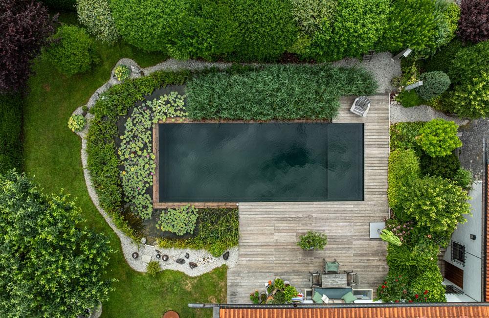Natural pool from above with swimming area and wooden terrace