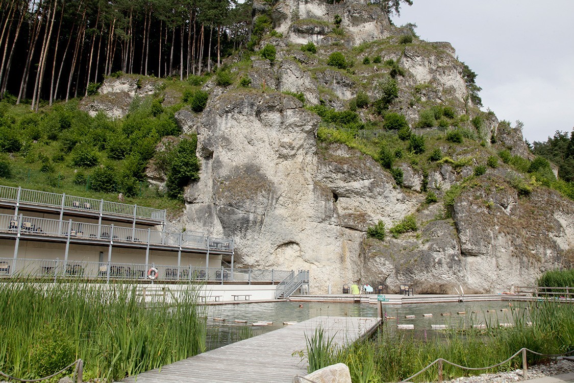 public natural pool with steep rocks